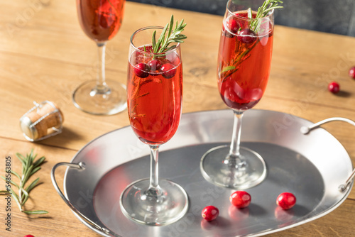 Boozy Refreshing Poinsettia Cranberry Champagne Cocktail