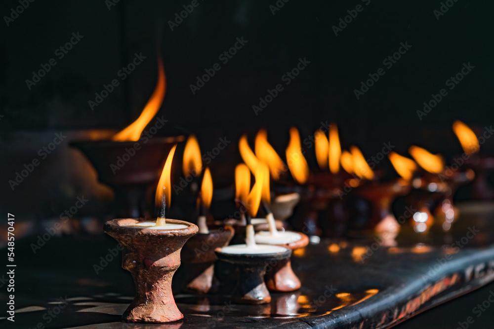 Woman performing her daily prayer at Buddhist temples in Kathmandu city. Woman performing her daily prayer at Buddhist temples in Kathmandu city.