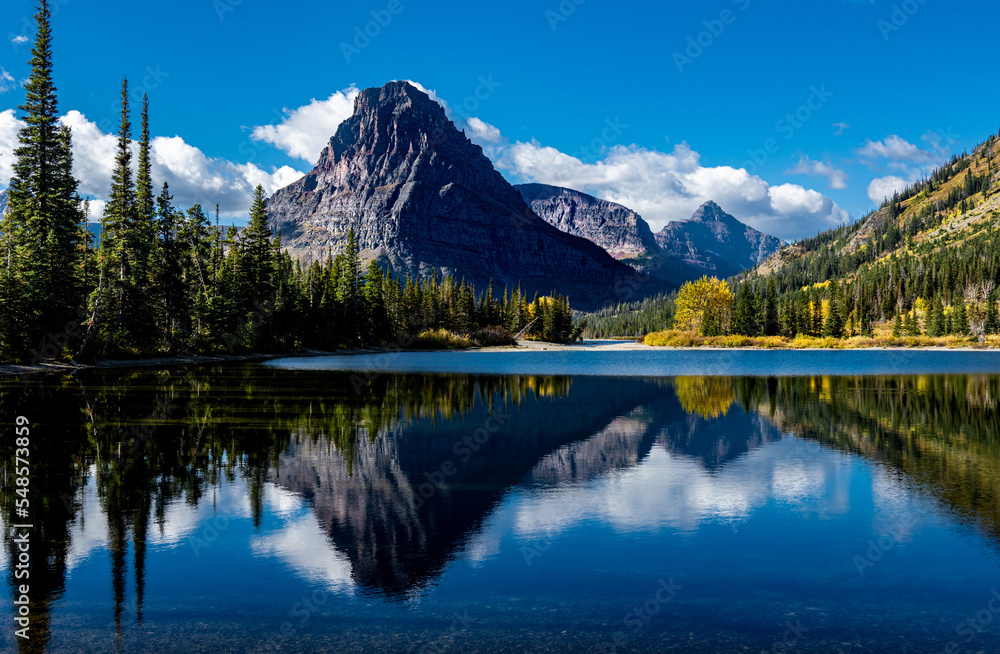 Sinopah Mountain across Two Medicine Lake with fall foliage