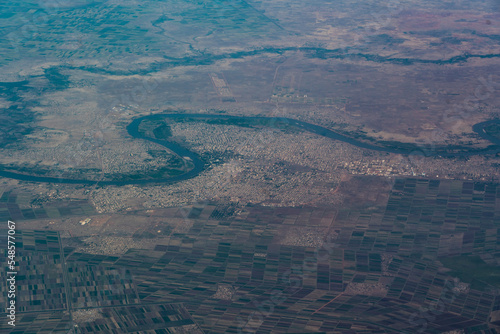 aerial landscape view of winding course of the "Blue Nile" river around the City of Wad Madani (capital of  State Gezira) on the West Bank of river Blue Nile in east-central Sudan - Africa © Mario Hagen