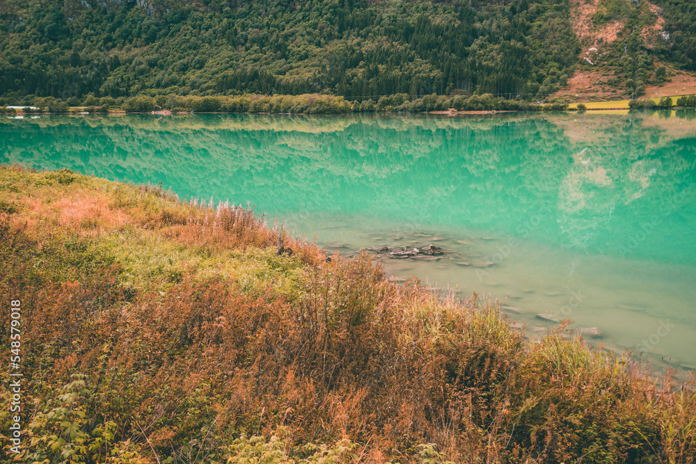 Beautiful fjord in Norway with very bright water on a beautiful autumn day Beautiful fjord in Norway with very bright water on a beautiful autumn day