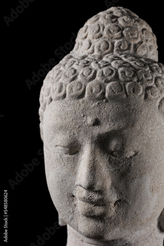 Buddha portrait isolated on black