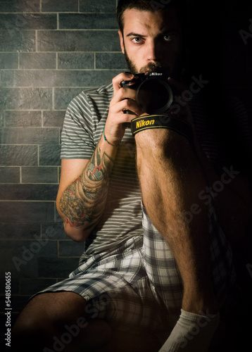 portrait of a man with camera