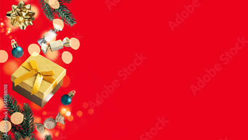 Merry Christmas and Happy New Year holiday card with gold and silver gifts and decor levitating on red