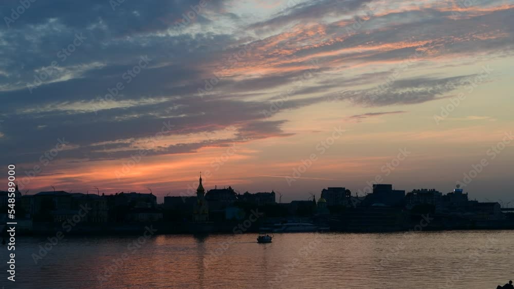 Nice evening Kiev city view from left coast of Dnipro river at summer sunset time Nice evening Kiev city view from left coast of Dnipro river at summer sunset time