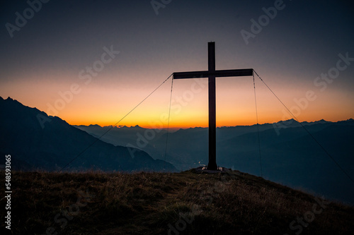 cross in the sunset time