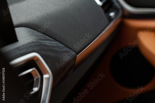 Modern car interior close up view with metallic and plastic details. Interior detail..