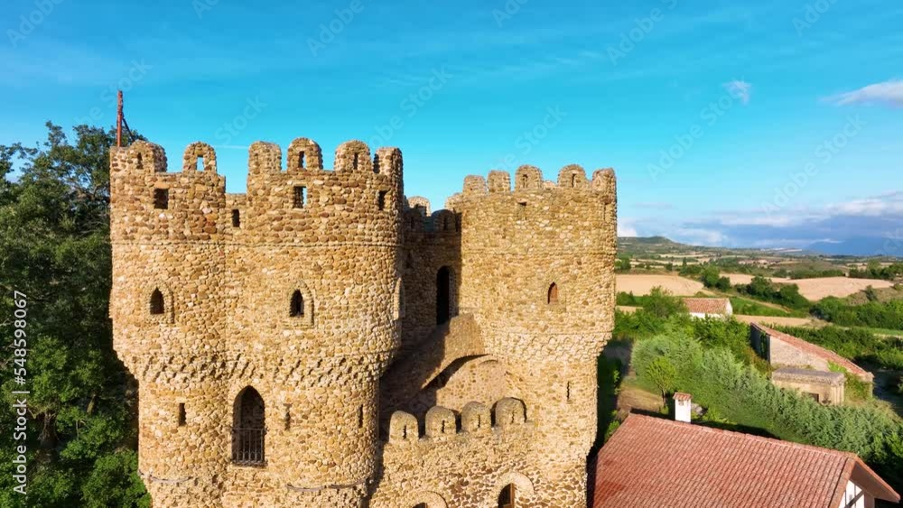 Las Cuevas Castle and town of Cebolleros. Aerial view from a drone. Merindad de Cuesta-Urria. Las Merindades region. Burgos, Castilla y Leon, Spain, Europe Las Cuevas Castle and town of Cebolleros. Aerial view from a drone. Merindad de Cuesta-Urria. Las Merindades region. Burgos, Castilla y Leon, Spain, Europe