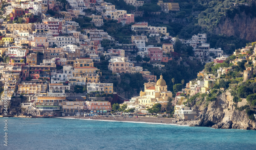Touristic Town, Positano, on Rocky Cliffs and Mountain Landscape by the Tyrrhenian Sea. Amalfi Coast, Italy. Sunny Sunset