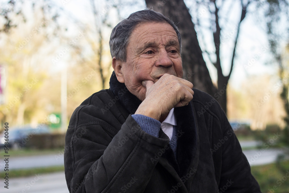 Lonely senior man sitting on bench Lonely senior man sitting on bench