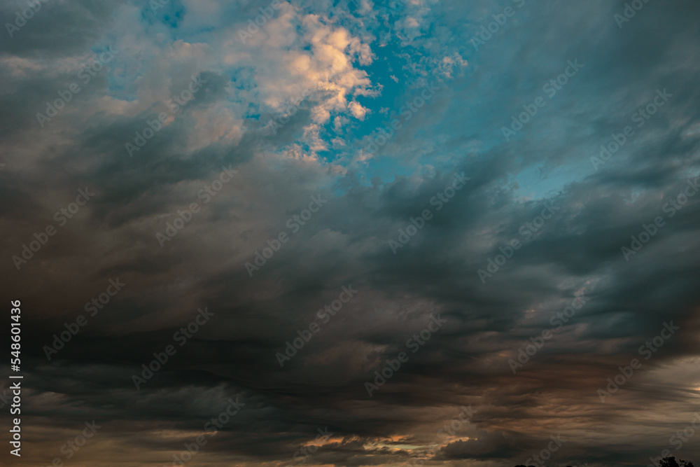 Dramatic or cinematic clouds. Cloudscape at sunset or sunrise