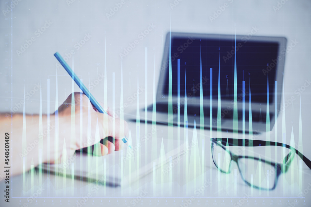Multi exposure of man hands with stock market forex graph. Multi exposure of man hands with stock market forex graph.