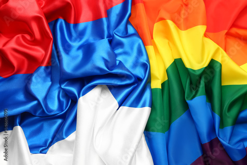 Flags of LGBT and Russia as background, closeup