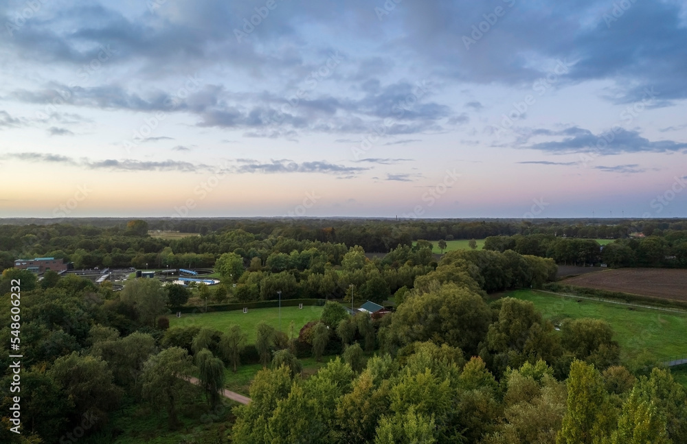 Aerial view of green fields and countryside at sunset. Aerial landscape photo. Gronau, Germany
