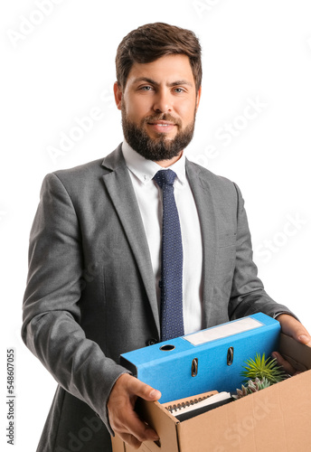Fired young man holding box...