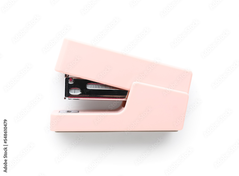 Pink office stapler on white background Pink office stapler on white background