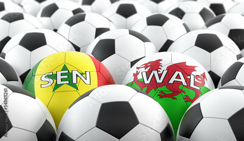 Wales vs. Senegal Soccer Match - Soccer balls in Wales and Senegal national colors on a soccer field. 3D Rendering 