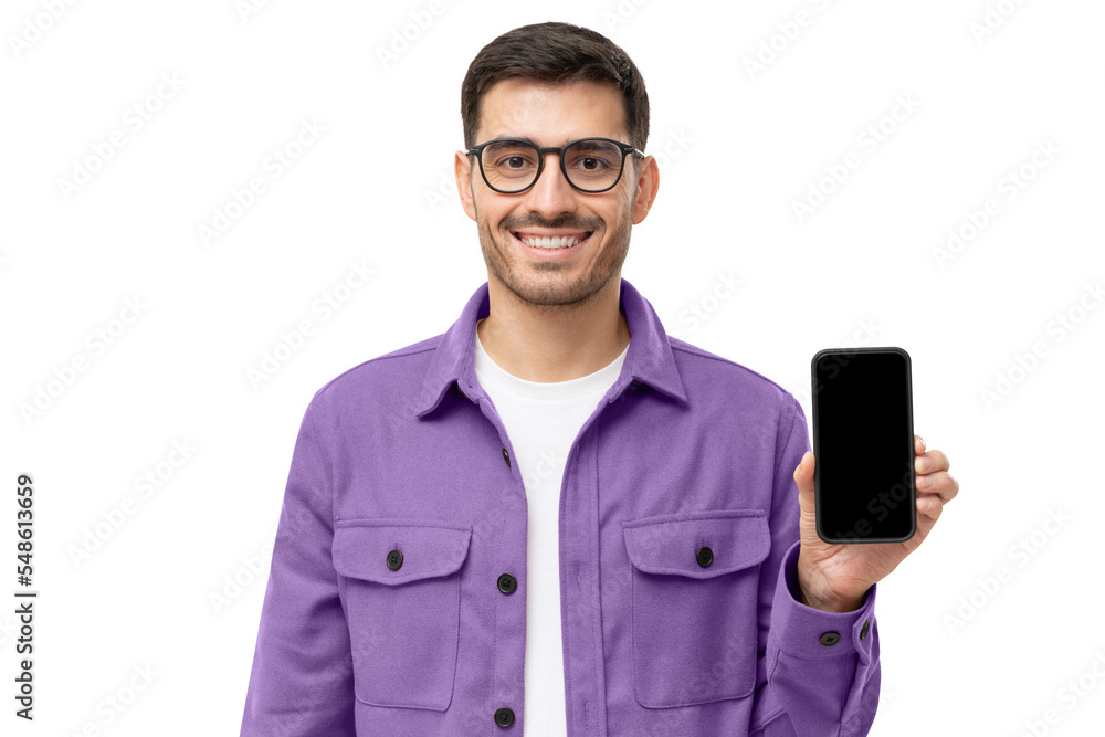 Young smiling man in casual purple shirt showing blank screen smartphone in hand Young smiling man in casual purple shirt showing blank screen smartphone in hand