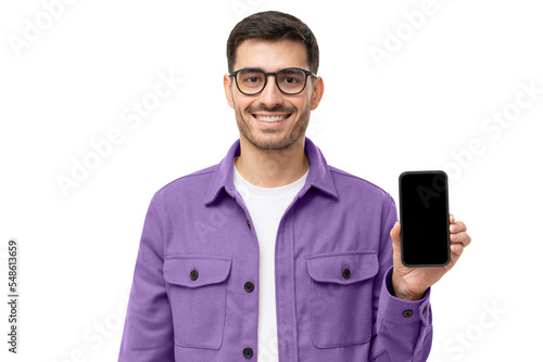 Young smiling man in casual purple shirt showing blank screen smartphone in hand © Damir Khabirov