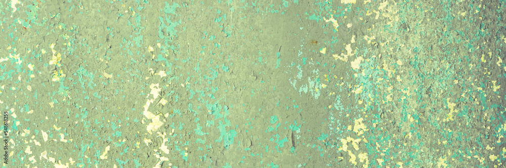 Peeling paint on the wall. Panorama of a concrete wall with old cracked flaking paint. Weathered rough painted surface with patterns of cracks and peeling. Wide panoramic texture for grunge background Peeling paint on the wall. Panorama of a concrete wall with old cracked flaking paint. Weathered rough painted surface with patterns of cracks and peeling. Wide panoramic texture for grunge background