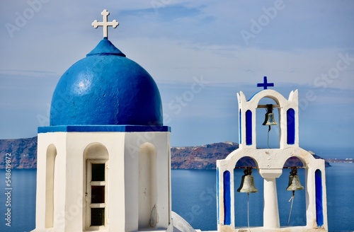 Blue Domes And Church Bells In Santorini, Greece