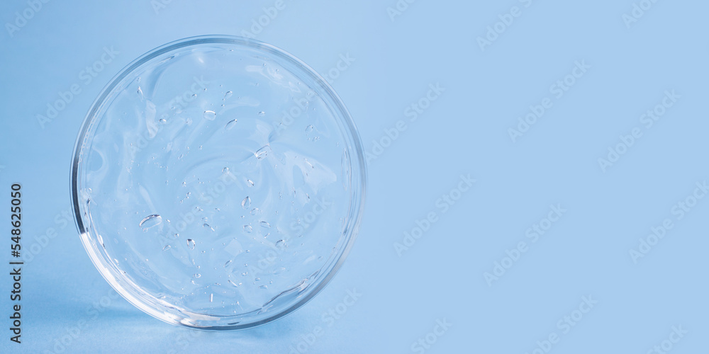 Closeup photography of cosmetics gel with bubbly structure in the petri dish.Cosmetics large banner with copy space. Closeup photography of cosmetics gel with bubbly structure in the petri dish.Cosmetics large banner with copy space.