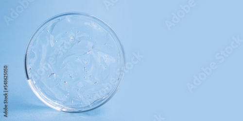 Closeup photography of cosmetics gel with bubbly structure in the petri dish.Cosmetics large banner with copy space.