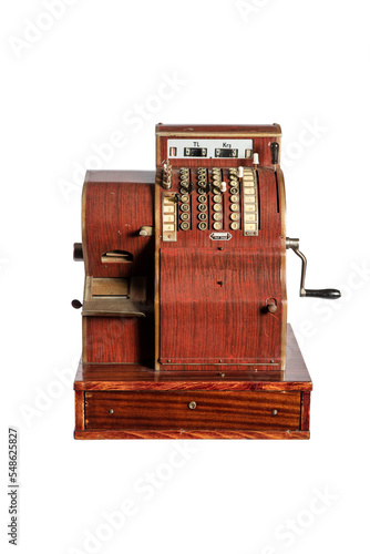 Old-time cash register in a shop. Isolated on white background.