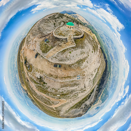 Panoramic planet of Mount Tomorr - is situated within the Tomorr National Park with Shrine (tyrbe) of Abbas ibn Ali on the top - in Summer, Albania photo