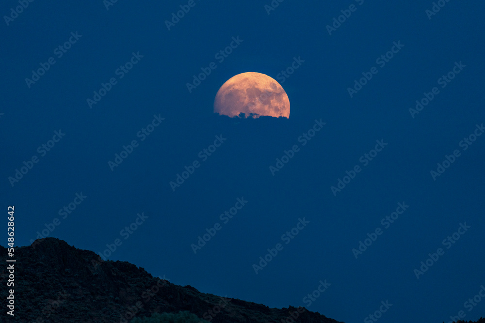 USA, Idaho, bellevue, Full moon rising over mountain USA, Idaho, bellevue, Full moon rising over mountain