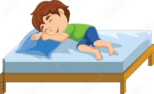 Cartoon little boy sleeping in bed