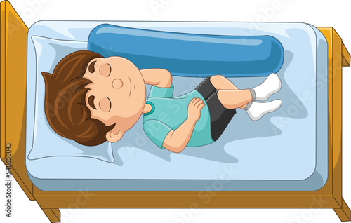 Cartoon little boy sleeping in bed