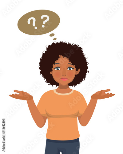 young African woman feeling confused, doubt and clueless showing I have no idea gesture, shrugging shoulders and raising hands with puzzled facial expression