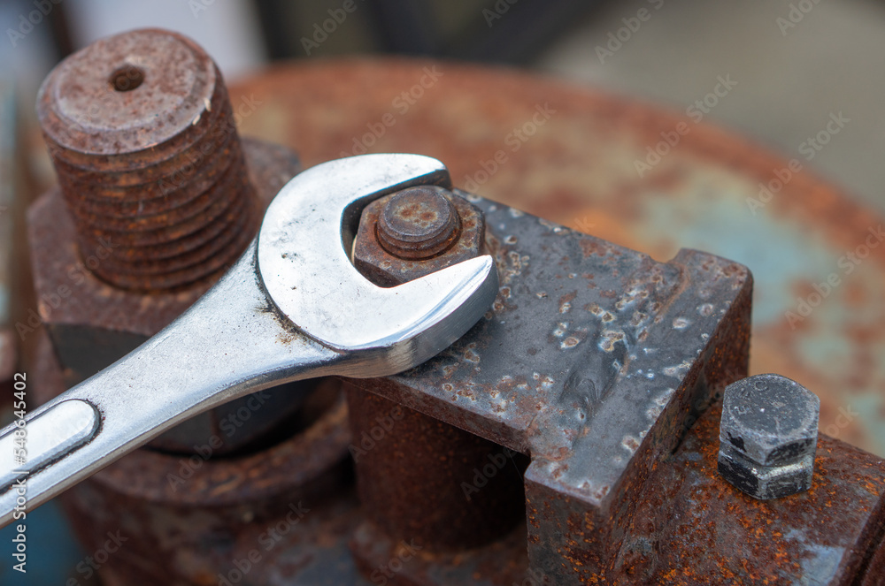 Spanner for tightening bolts in old rusty iron rods, wrenches, bolts, screws and nuts.