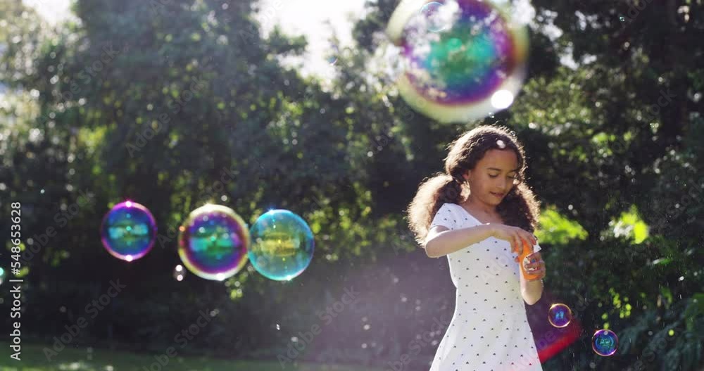 Girl kid blowing soap bubbles in park, garden and nature, having fun, joy and childhood development, freedom and relax in sunshine. Happy black child playing with bubble wand, toy games and outdoors Girl kid blowing soap bubbles in park, garden and nature, having fun, joy and childhood development, freedom and relax in sunshine. Happy black child playing with bubble wand, toy games and outdoors