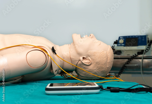 Simulated patient, defibrillator electrodes, performing defibrillation or electro pulse therapy, CPR model