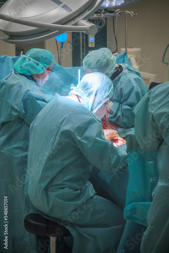 an operation is performed in an operating room