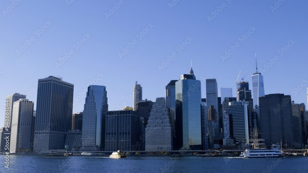 Manhatten skyline over East River. Manhatten skyline over East River.