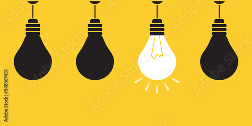 Three broken light bulbs and one glow bulb. Good and bad ideas - brainstorming. Search for new ideas for successful business or development. Creativity, pitching idea, innovation.