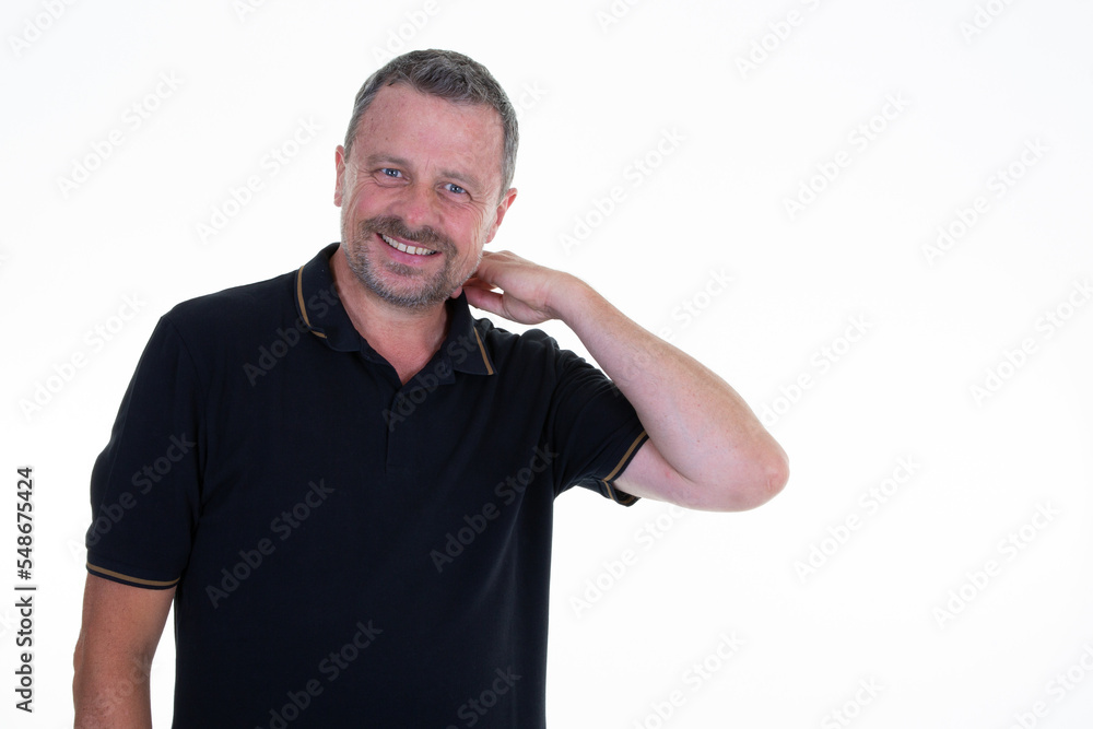 handsome man in middle age against white background hands arm on head neck handsome man in middle age against white background hands arm on head neck