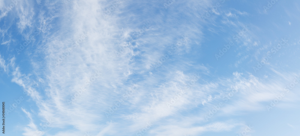 Blue day sky background with tiny clouds, panorama Blue day sky background with tiny clouds, panorama