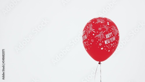 Red balloon for New Year party on the white background, HD.