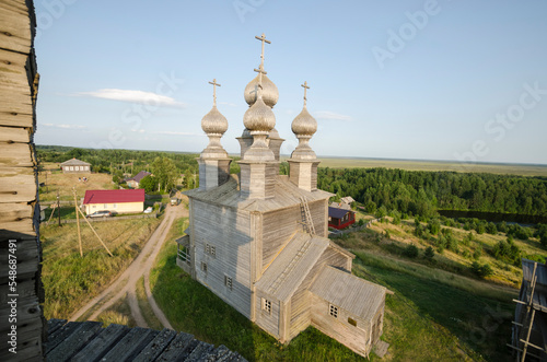 Nicholas Church in the village of Vorzogory. Russia, Arkhangelsk region, Onega district photo