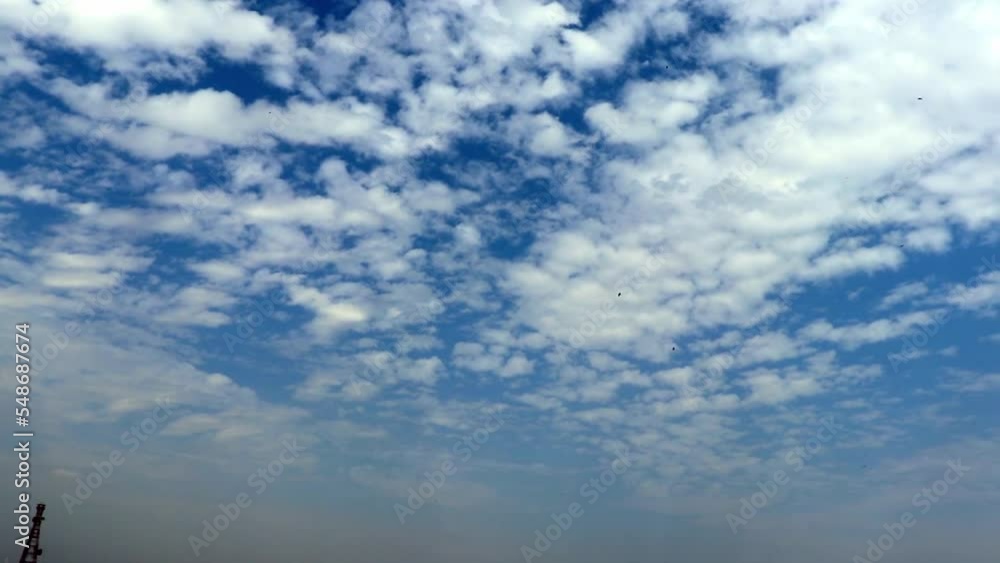 dramatic bright blue sky cluttered with white cloud at evening dramatic bright blue sky cluttered with white cloud at evening
