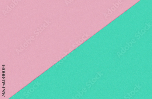 Diagonally pink green split colour papers with textures. Pastel colour background for your objects.