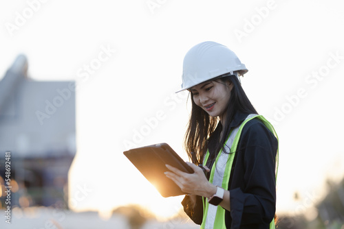 Engineer black woman standing on a construction site for portraits in a happy mood