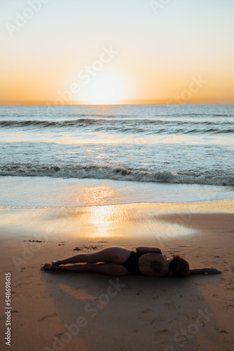 Girl on the beach sunset