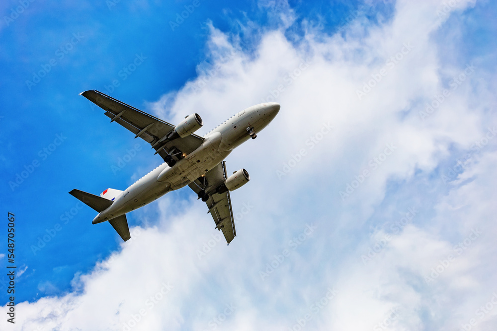 Airplane flying on the blue sky and cloud Airplane flying on the blue sky and cloud