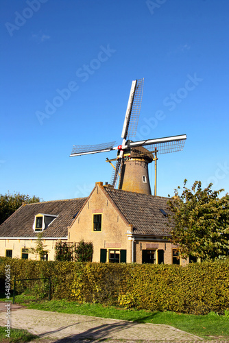 Dutch windmill in Hoofddorp in bright summer day
