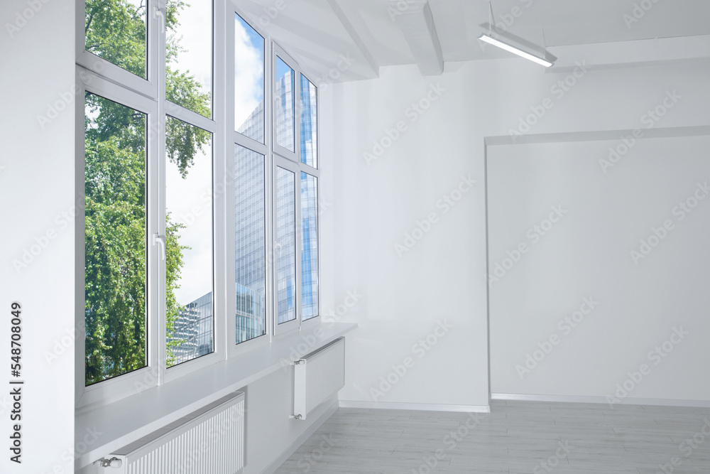 Fototapeta premium New empty room with clean windows and white walls